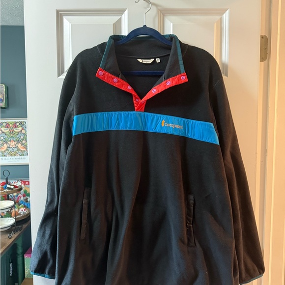 cotopaxi Jackets & Blazers - cotopaxi Black Fleece Pullover with Blue Chest Stripe and Red Snap Placket
